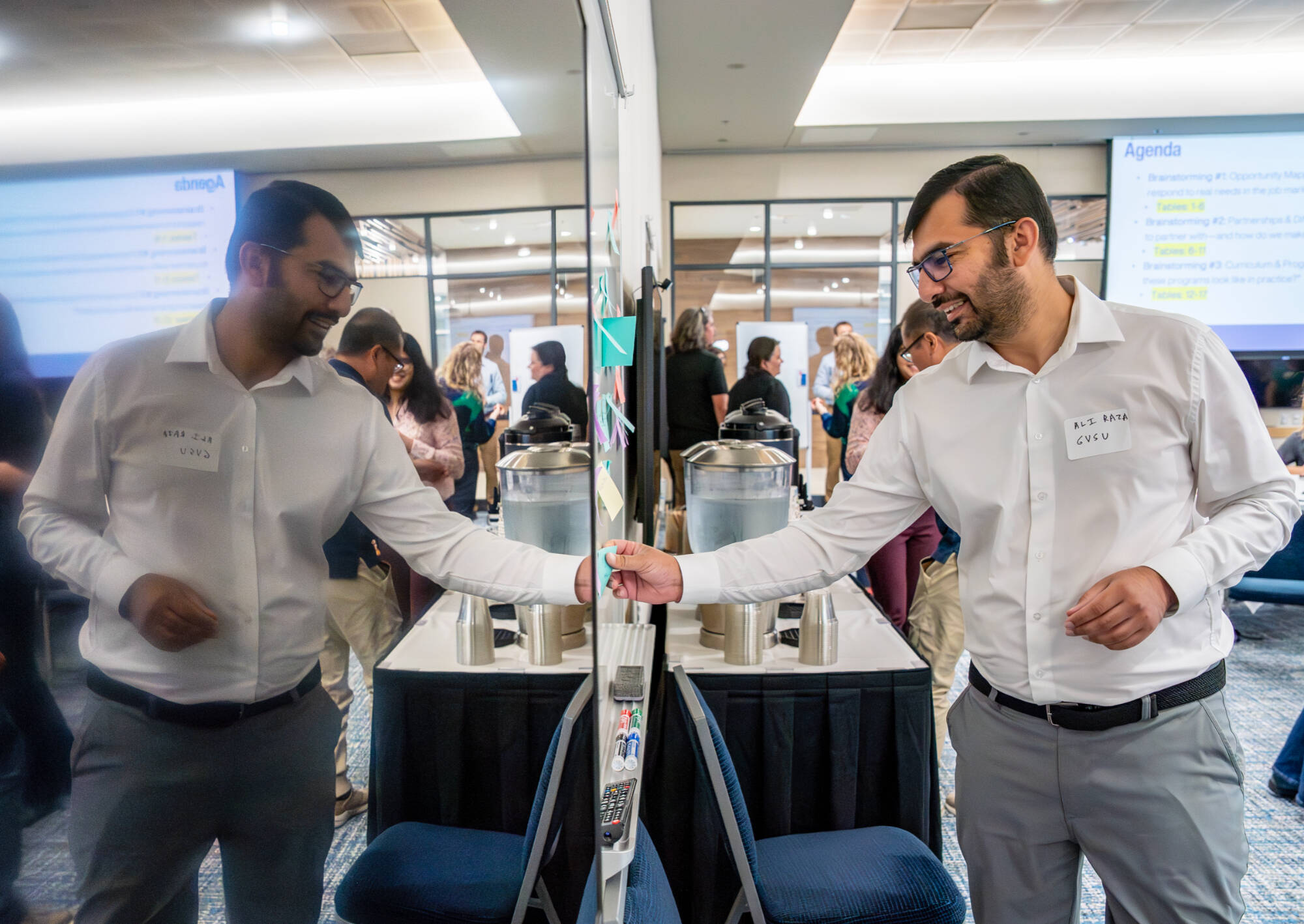 Assistant Professor of Computing Ali Raza takes part in a College of Computing brainstorming session at the DeVos Center for Interprofessional Health on August 7.
